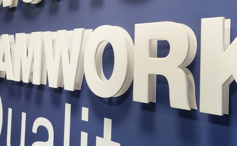 Letters on a rowmark sign